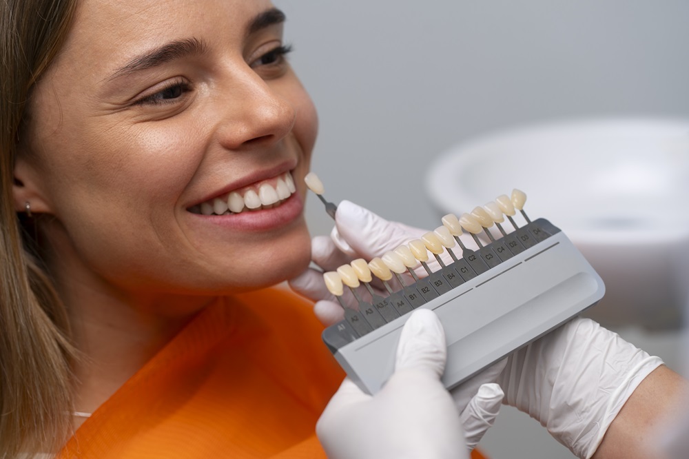 dentist showing veneers options